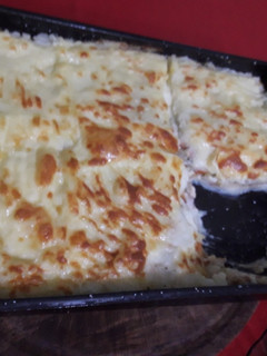 Una foto de Pastel de papas relleno de pollo