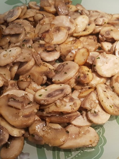 Una foto de Champiñones a la plancha