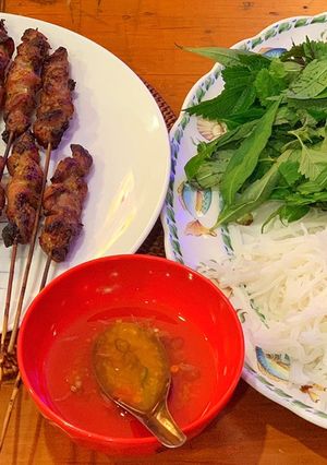 A picture of Chargrilled pork neck with vermicelli noodles.
