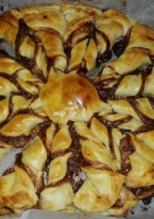 Una foto de Estrella de hojaldre con crema de cacao