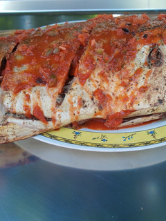 Una foto de Pescado asado al carbón