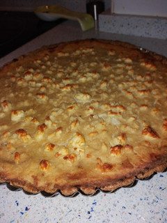 Una foto de Quiche cebolla caramelizada🏺