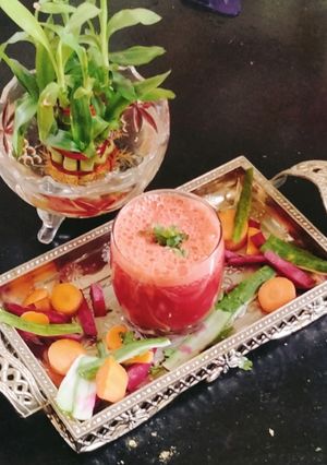 A picture of Watermelon juice with sabja seed.