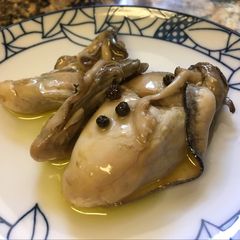 A picture of Oysters in oil.