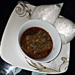 A picture of Rice swallow with fresh karkashi leafs soup.