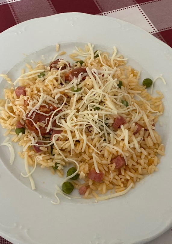 Una foto de Arroz milanesa