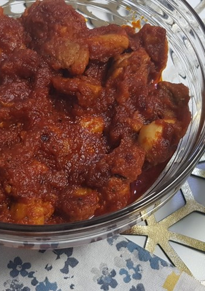 Una foto de Magra con tomate
