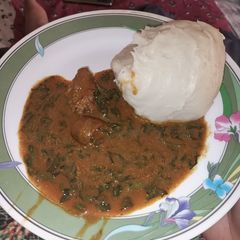 A picture of Pounded yam and ogbono soup.