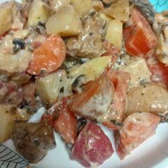 A picture of N. Y. Strip and Potato Salad.