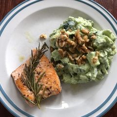 A picture of Salmon with cucumber guacamole.