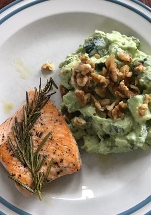 A picture of Salmon with cucumber guacamole.