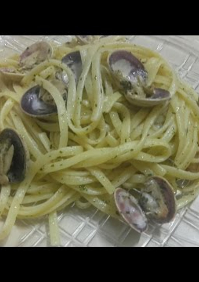 Una foto de Tallarines/espagetis con almejas