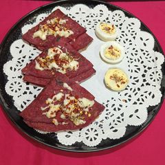 Protein Loaded Cheesey Egg Stuffed Beetroot Paratha Tortilla Wrap A picture of Protein Loaded Cheesey Egg Stuffed Beetroot Paratha Tortilla Wrap.