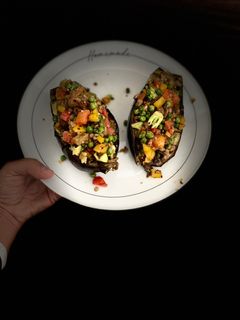 Una foto de Berenjenas Rellenas de Picadillo de Lentejas