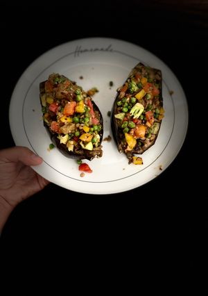 A picture of Lentil Picadillo Stuffed Eggplants.