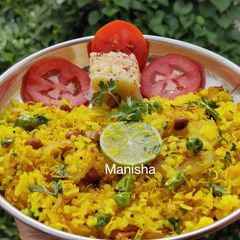 A picture of Kanda Batata Poha (Maharashtrian Breakfast).