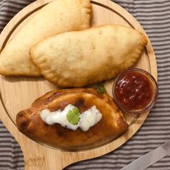 Baked/ deep fried calzone A picture of Baked/ deep fried calzone.