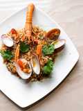RISO INTEGRALE CON SCAMPI, FASOLARI E CAROTE