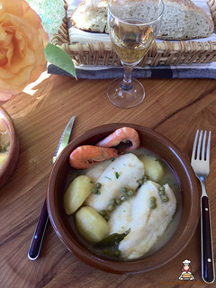 Una foto de Merluza en salsa verde con patatas