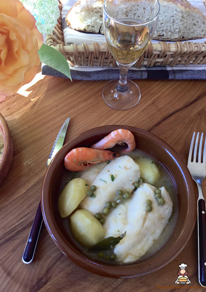 Una foto de Merluza en salsa verde con patatas