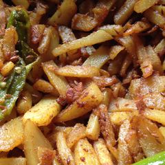 A picture of Slow Cooked Jeera Aalu/potato stir fry.