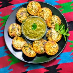 A picture of Chaulai(Amaranth leaves) Appam with Chutney(no onion garlic).