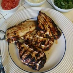 A picture of Marinated chicken for tacos.
