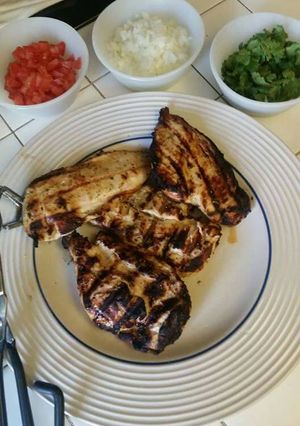 A picture of Marinated chicken for tacos.