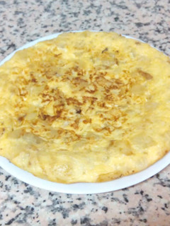 Una foto de Tortilla de patatas con cebolla