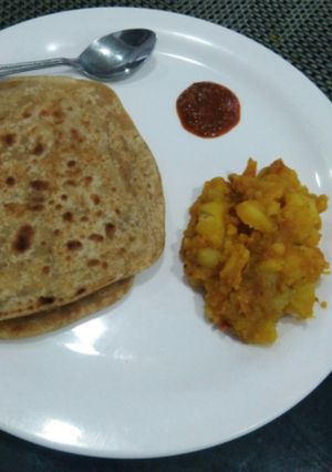 A picture of Salt paratha with Aloo Sabzi.