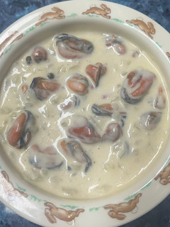 Una foto de Mejillones a la pimienta verde