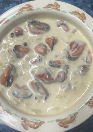 Foto principal de Mejillones a la pimienta verde