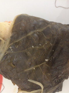Una foto de Tamal en hoja de acelga