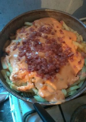 Una foto de Papas con cheddar y panceta