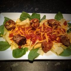 A picture of Home made Meatballs, Pasta & tomato sauce.