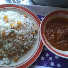 A picture of White Rice and Vegetable, with stew.