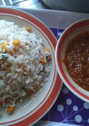 A picture of White Rice and Vegetable, with stew.
