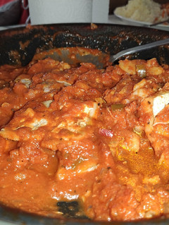Una foto de Bacalao con salsa de tomate picante