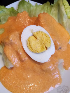 Una foto de Papas y Pimientos a la Huancaína