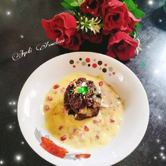 Chocolate Bread pudding with custard sauce A picture of Chocolate Bread pudding with custard sauce.