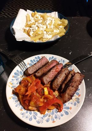 A picture of Harissa steak with pepper and lemon sauce.