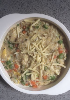 Foto resep Cheesy egg drop porridge - mpasi 10mo