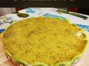 Una foto di cheesecake ai kiwi