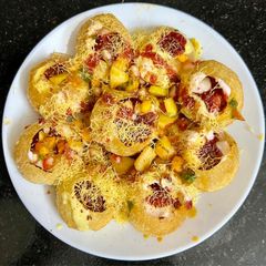 A picture of Fruity dahi poori with flavored Greek dahi & plum chutney.