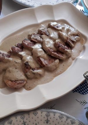 A picture of Pork Tenderloin with Pepper Sauce.