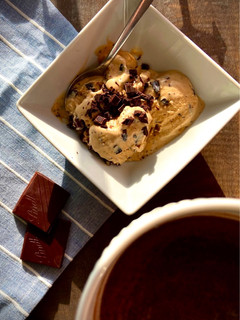 A picture of Coffee ice cream ☕️ with dark chocolate 🍫 chips!!.