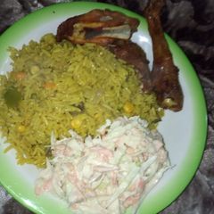 Fried rice and chicken A picture of Fried rice and chicken.