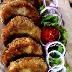 A picture of Chicken cheese potato cutlut.