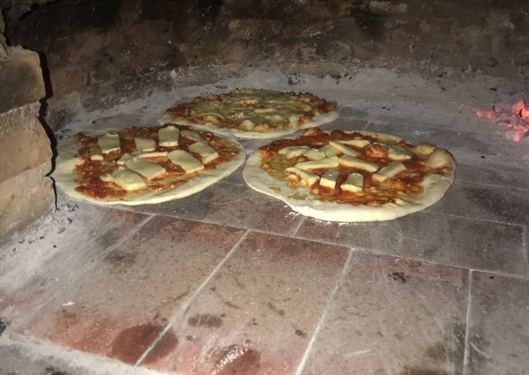 Pizza Al Horno De Barro Receta De Luiggi Ser Cookpad 9987