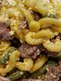 Gramigna con crema di ricotta allo zafferano con salsiccia